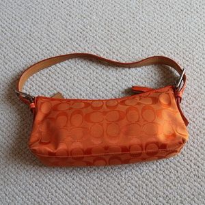 Coach orange canvas baguette purse